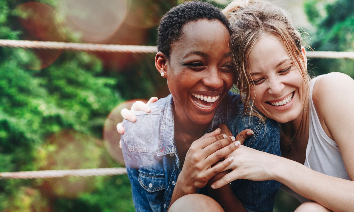 Leap Pediatric and Adolescent Care Two young women friends hug each other